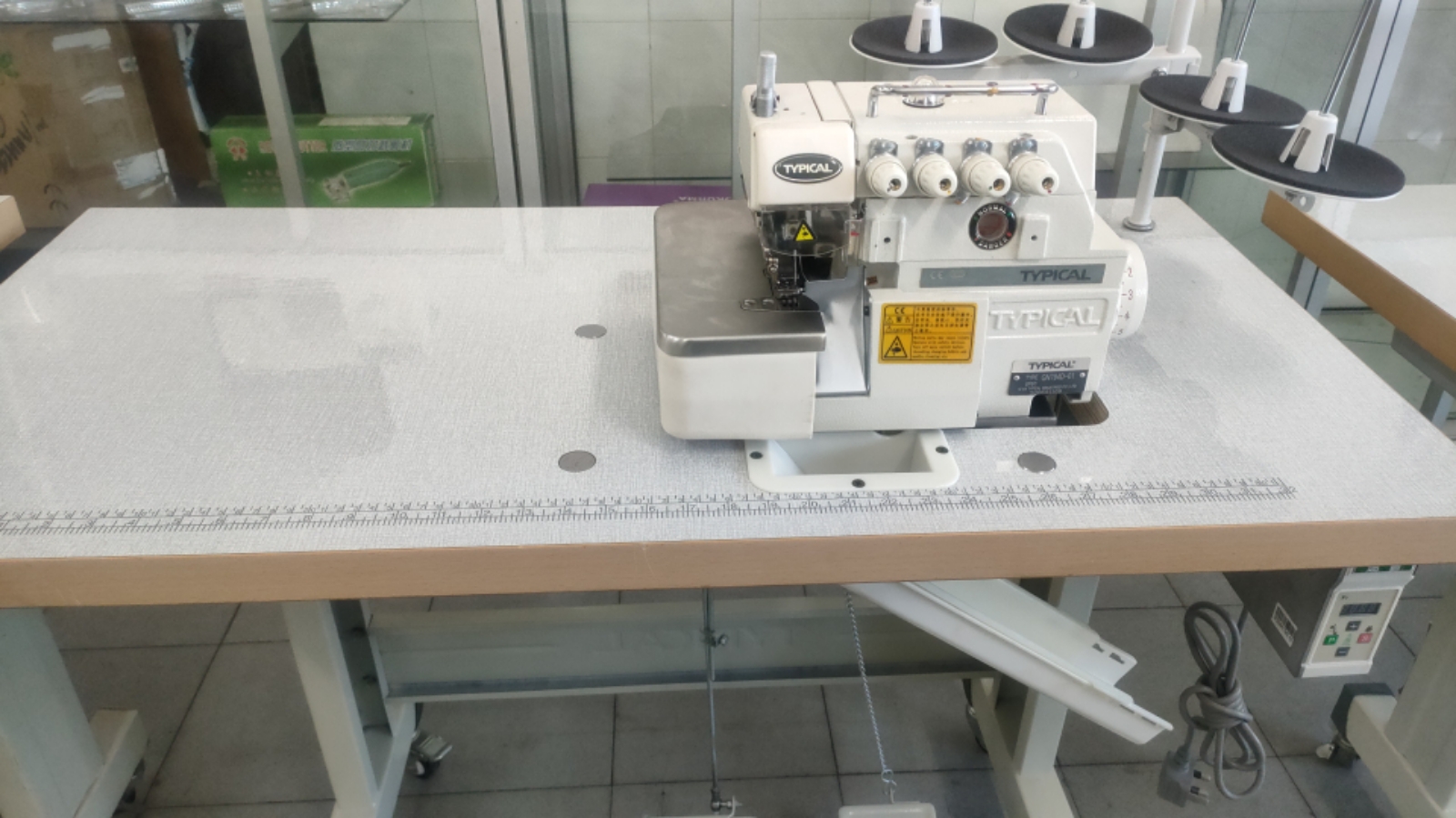 TYPICAL OVERLOCK SEWING MACHINE