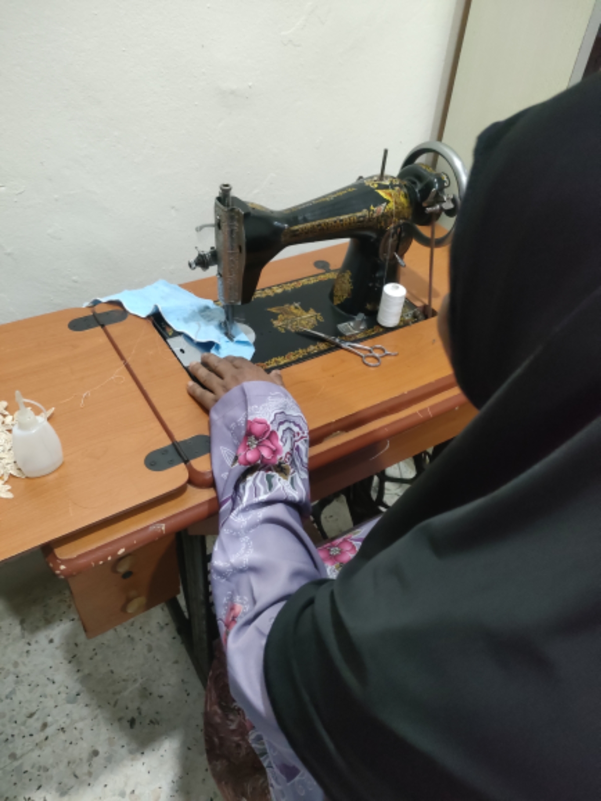 DELIVER SEWING MACHINE