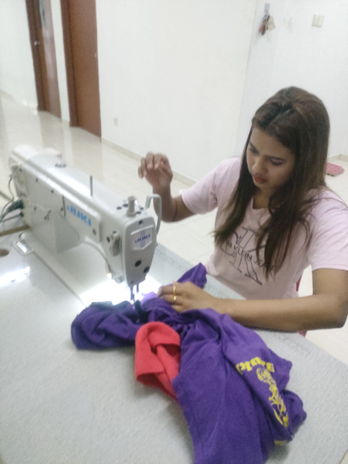 DELIVERY SEWING MACHINE