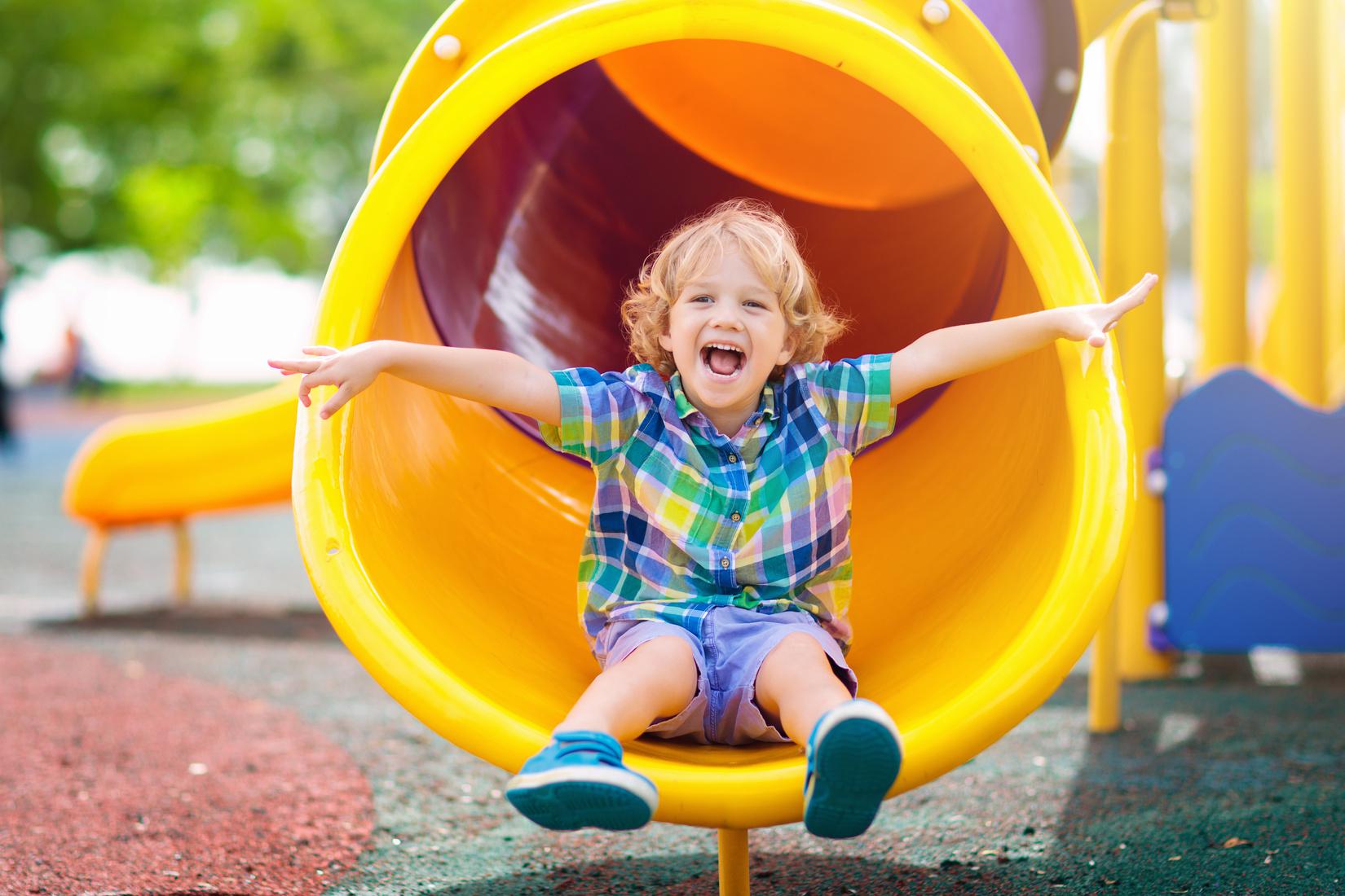 Child on playground slide