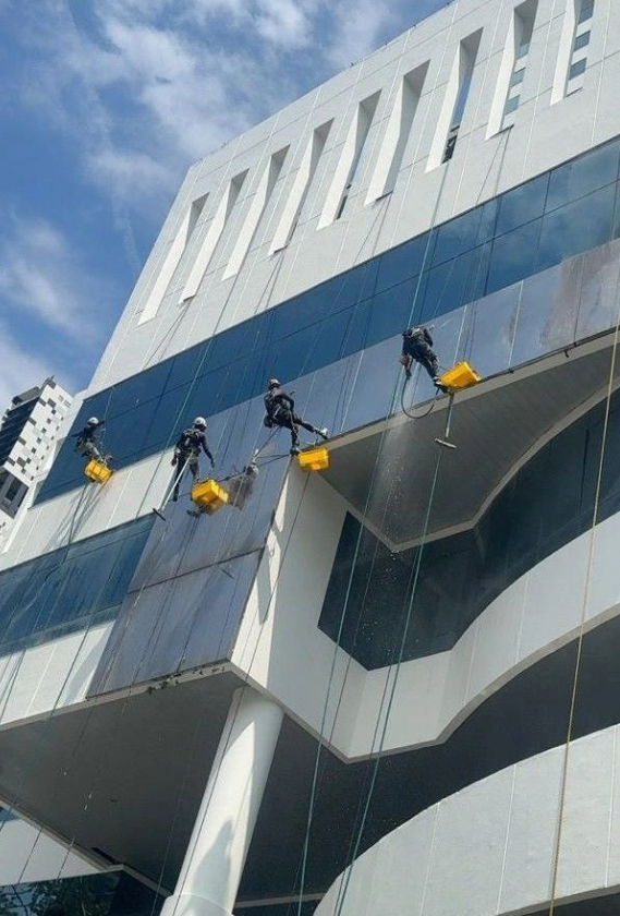 Facade cleaning service for commercial building exterior by Z Star