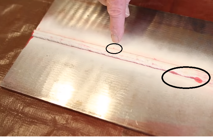 dye penetrant testing shows a test piece with defects